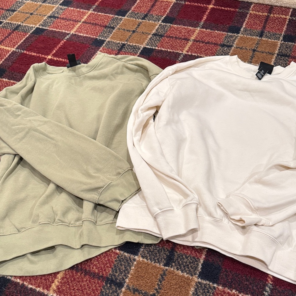 2 men’s H&M Cream and light Green Crew Neck Sweatshirts. Worn a few times.